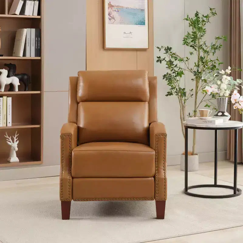 Poltrona reclinabile a spinta con rivestimento in similpelle e decorazione a rivetti
